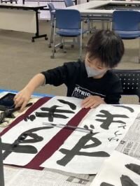 奈良東コープ委員会:冬休み子ども企画“書き初め”のための習字教室