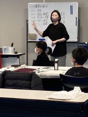奈良東コープ委員会:冬休み子ども企画“書き初め”のための習字教室