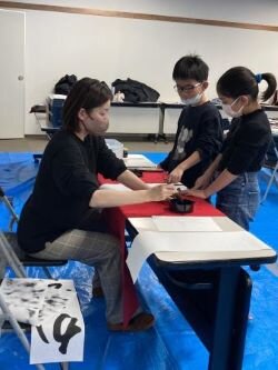 奈良東コープ委員会:冬休み子ども企画“書き初め”のための習字教室